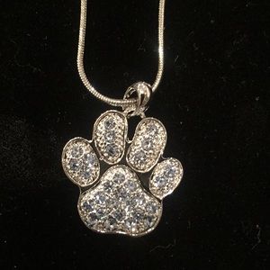 Rhodium Plated Paw Charm Necklace. Blue Crystals